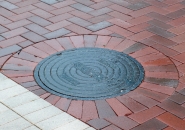 Sharp edges of cut pavers can chip if adequate space is not allowed between adjacent pavers