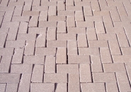 Loss of joint sand allows pavers to move, chip and erode