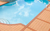 Fired-Clay Paving Brick Surround This Syracuse, New York Pool